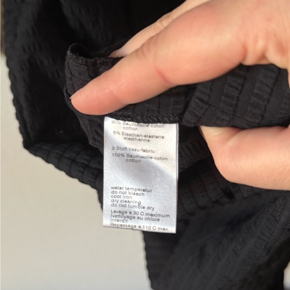 Akris Punto Elegant Black Long Sleeve Faux Wrap Dress With Textured Skirt - Picture 7 of 11